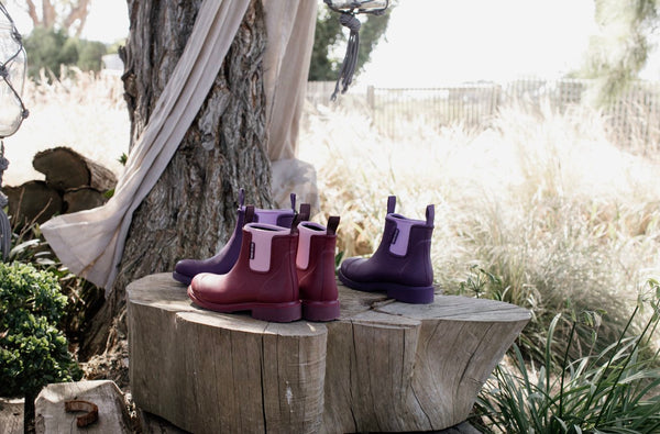 Three images of different colour Bobbi gumboots from Merry People